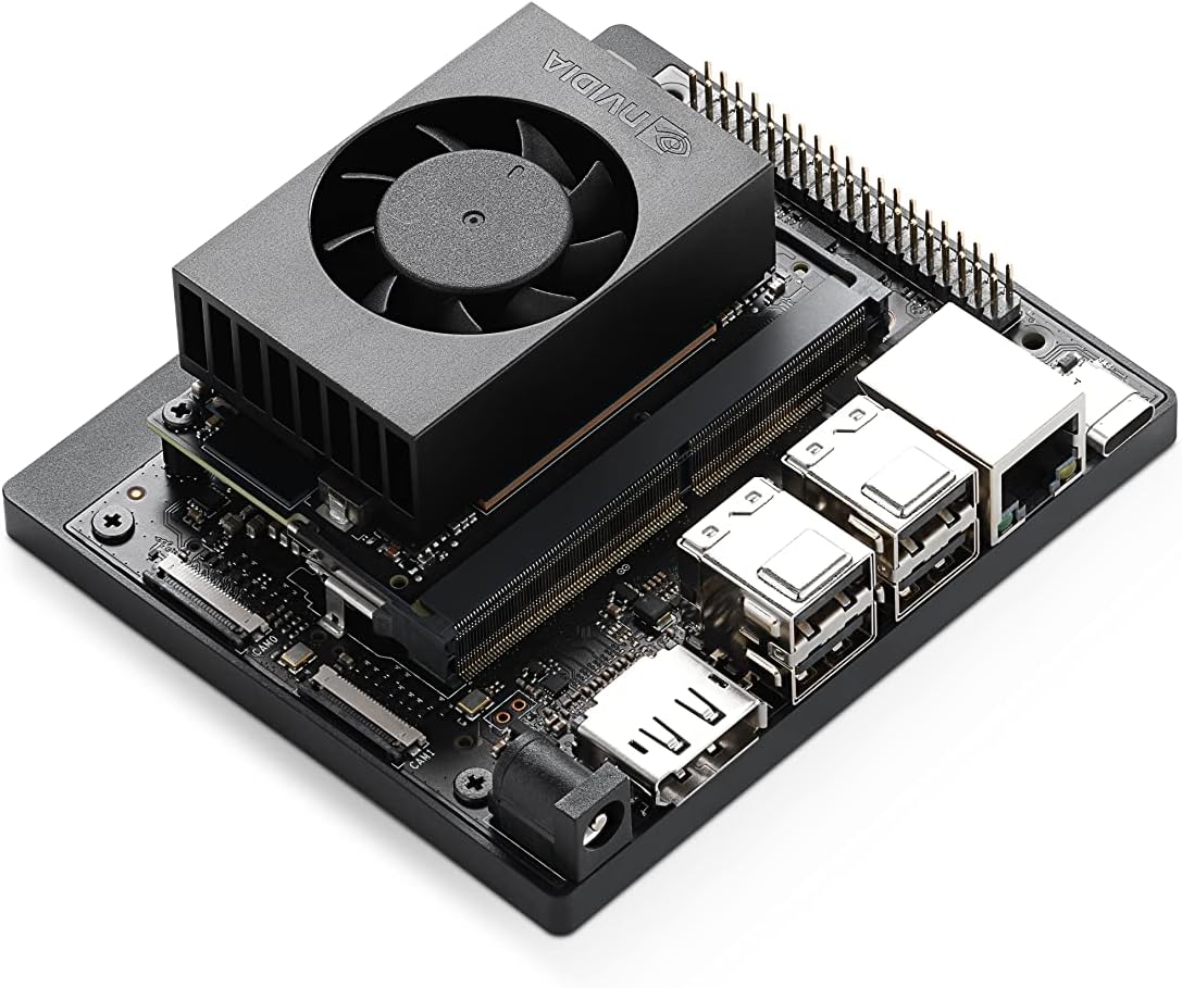 Installing NVIDIA Jetson Orin Nano Developer Kit Single Board Computer on a wooden desk